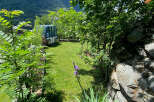 Discover a charming property nestled in a picturesque mountain setting, offering a serene escape.