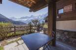 Enjoy breathtaking mountain views from this charming property.