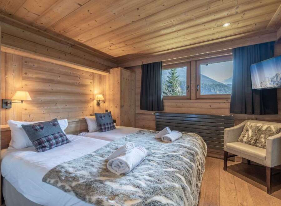 Experience the ultimate in alpine luxury with this stunning bedroom.