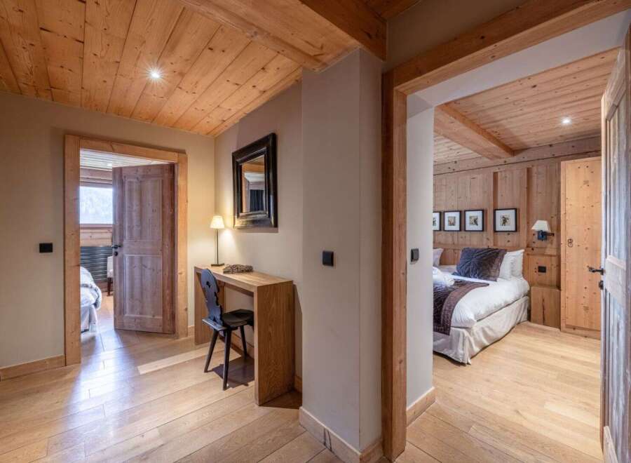 Step into luxury with this stunning property featuring exquisite wooden accents throughout.