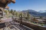 Enjoy breathtaking mountain views from this charming property.