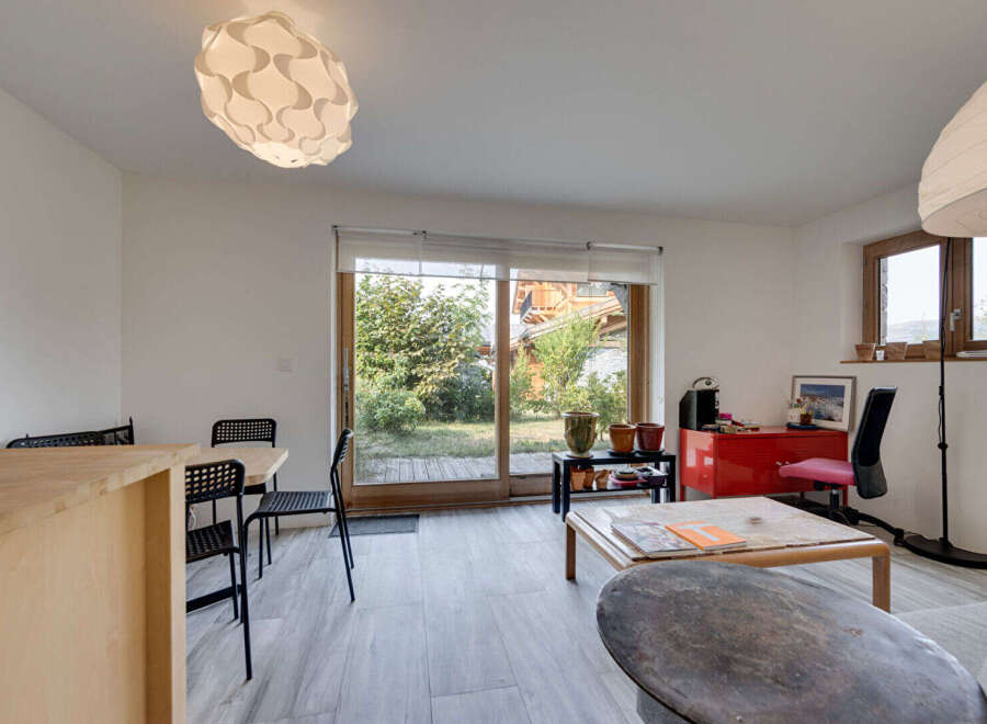This bright and airy living space features a modern design with ample natural light.