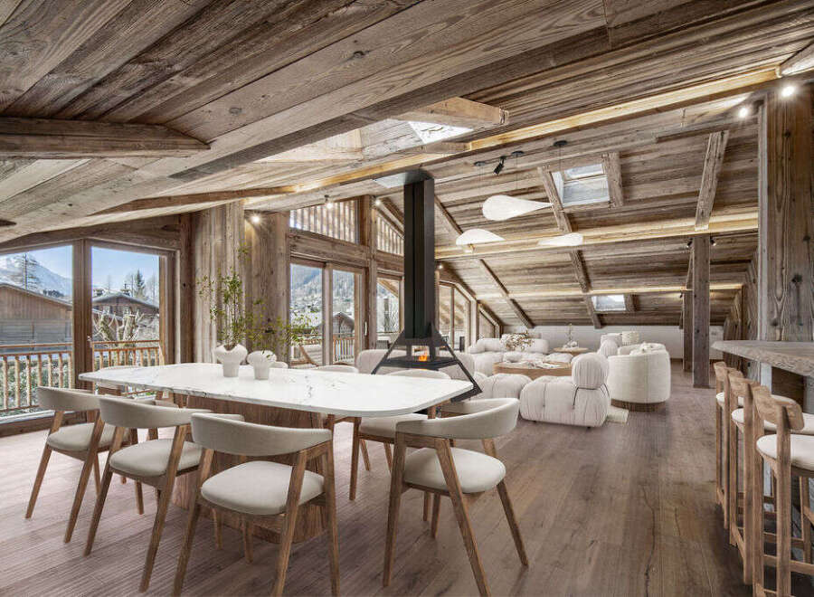 Experience luxury living in this stunning chalet, featuring a spacious open-plan design.