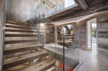 This stunning property showcases a modern interior design with a focus on natural materials.