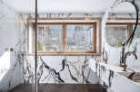 Experience luxury in this stunning bathroom featuring exquisite marble finishes and a serene ambiance.