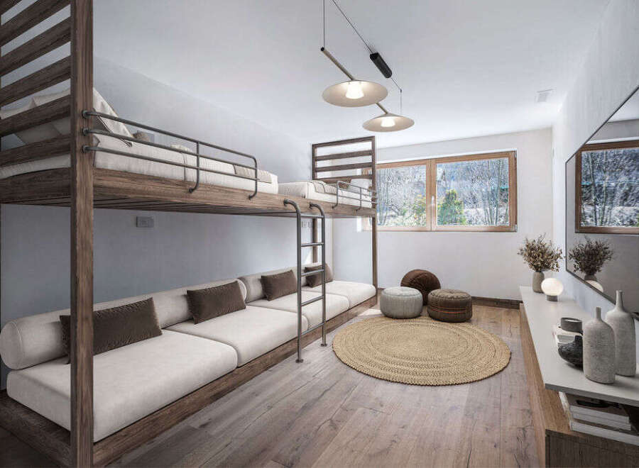 This modern bedroom features a unique bunk bed design with a comfortable sofa on the lower level, perfect for relaxation.