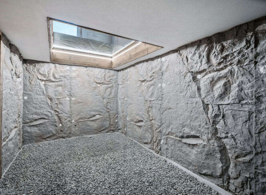 Discover the unique charm of this property, featuring stunning stone walls that create a rustic and inviting atmosphere.