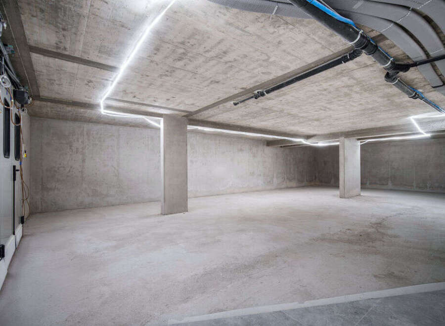 Explore this modern, unfinished space, perfect for a variety of uses.