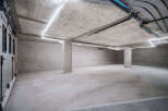 Explore this modern, unfinished space, perfect for a variety of uses.