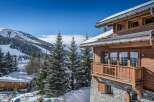 Experience the ultimate winter getaway in this stunning chalet nestled in the heart of the mountains.