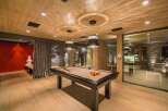 Step into luxury with this stunning property featuring a dedicated game room.