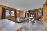 This charming wooden cabin offers a cozy and inviting atmosphere, perfect for a mountain getaway.