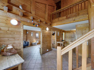 Step into rustic charm with this stunning wooden cabin.