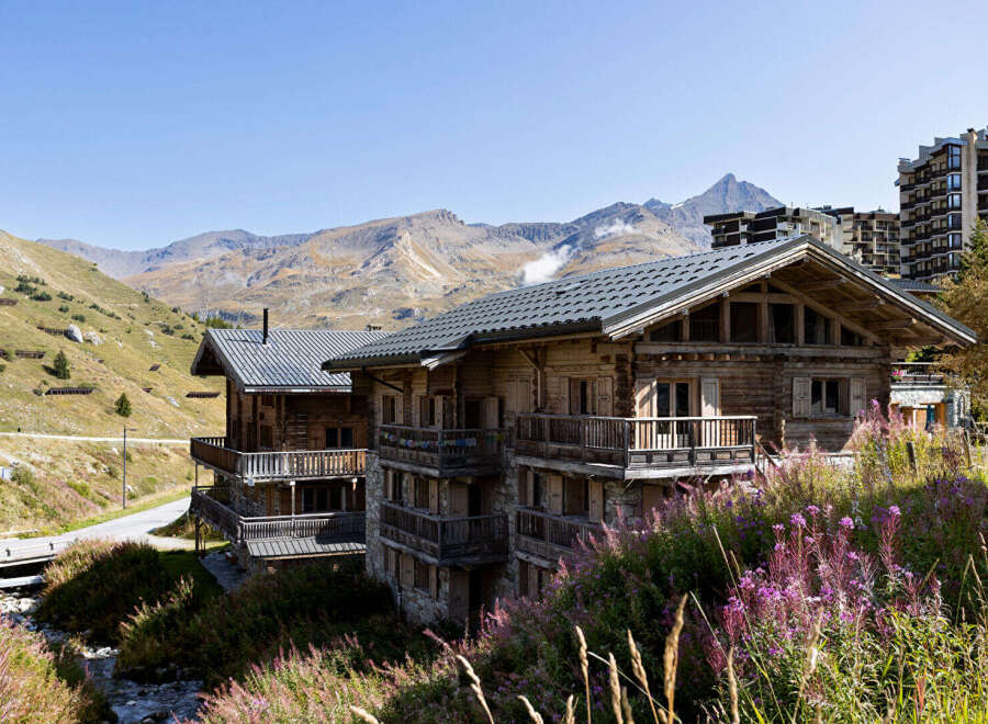 Nestled in a picturesque mountain setting, this stunning property offers a unique blend of rustic charm and modern comfort.