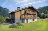 This stunning wooden chalet offers a perfect blend of rustic charm and modern comfort.