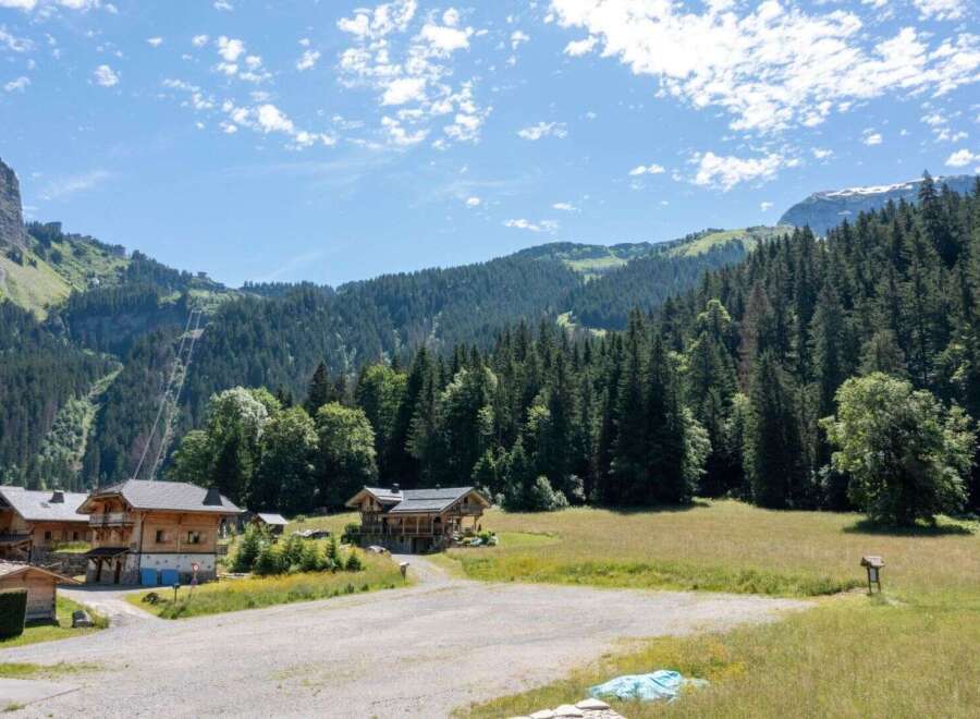 Nestled in a picturesque mountain landscape, this charming property offers a tranquil retreat.