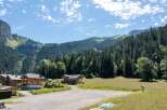 Nestled in a picturesque mountain landscape, this charming property offers a tranquil retreat.