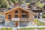 Discover the charm of this stunning 6-bedroom chalet, perfectly nestled in a picturesque mountain setting.