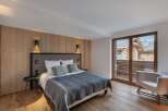 Experience luxury and comfort in this stunning bedroom.