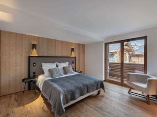 Experience luxury and comfort in this stunning bedroom.