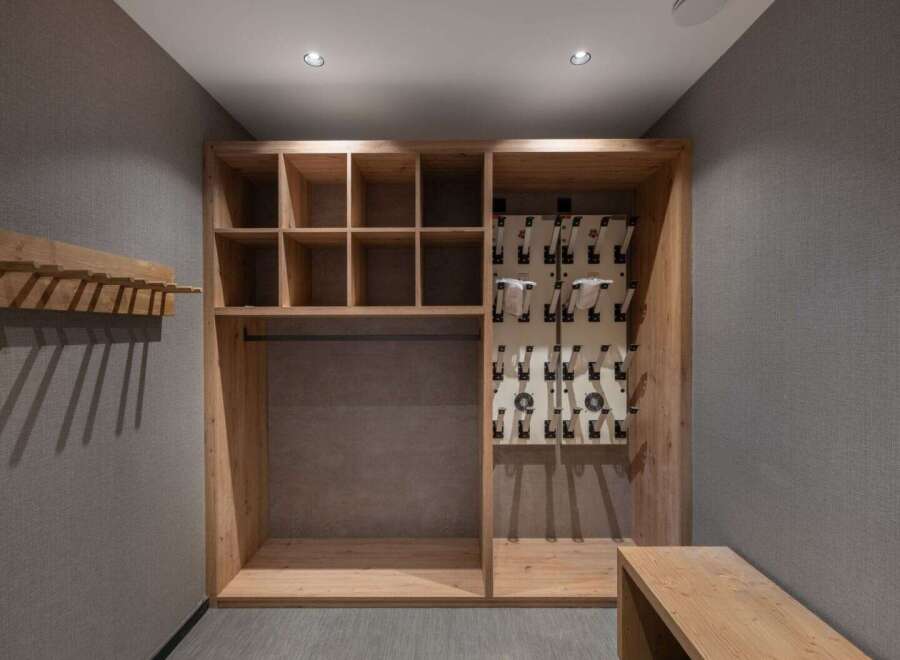 This well-designed storage space offers a blend of functionality and style, perfect for organizing gear.