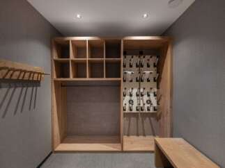 This well-designed storage space offers a blend of functionality and style, perfect for organizing gear.