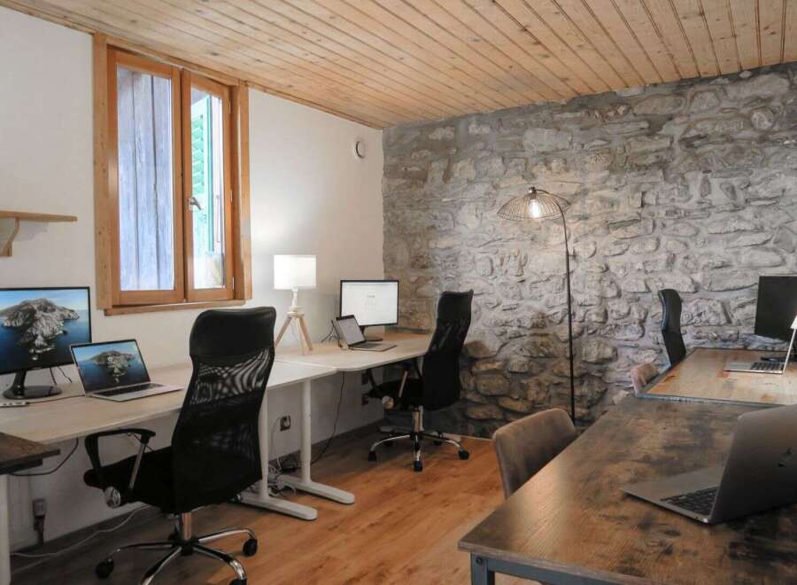 Discover the perfect blend of rustic charm and modern functionality in this stunning office space.