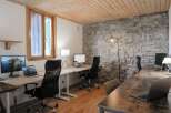 Discover the perfect blend of rustic charm and modern functionality in this stunning office space.