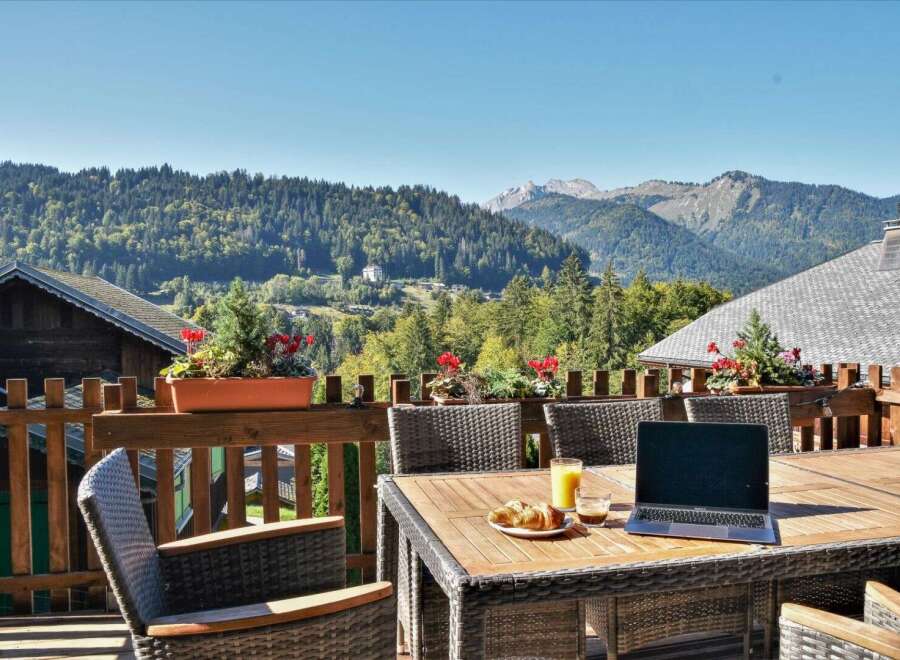 Enjoy breathtaking mountain views from this charming property.