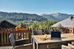 Enjoy breathtaking mountain views from this charming property.