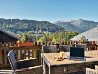 Enjoy breathtaking mountain views from this charming property.