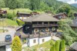 Discover the charm of this stunning chalet nestled in a picturesque mountain setting.