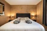 Experience the warmth and comfort of this beautifully designed bedroom.