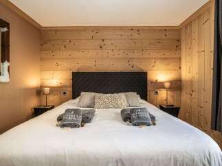 Experience the warmth and comfort of this beautifully designed bedroom.