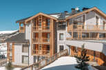 Discover the charm of this stunning mountain lodge, perfectly nestled in a picturesque winter wonderland.
