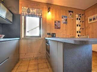 Discover the charm of this cozy kitchen, perfect for creating memorable meals.