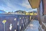Enjoy breathtaking mountain views from this charming balcony.