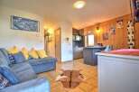 Discover the charm of this cozy living space, perfect for relaxation and entertainment.