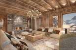 Experience the epitome of luxury living in this stunning chalet, featuring a cozy stone fireplace and exquisite wooden accents throughout.