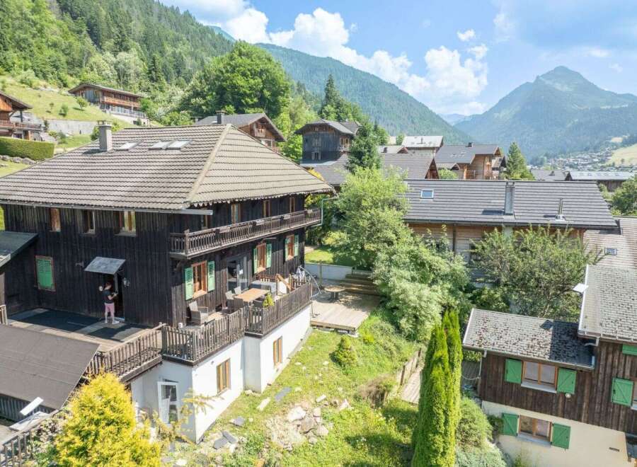 Nestled in a picturesque mountain village, this charming wooden chalet offers breathtaking views and a serene escape.
