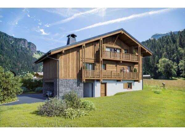 This stunning chalet-style home offers a perfect blend of rustic charm and modern comfort.