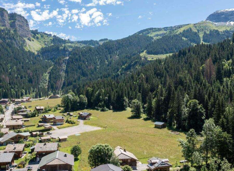 Nestled in a picturesque mountain valley, this charming property offers stunning views and a tranquil escape.