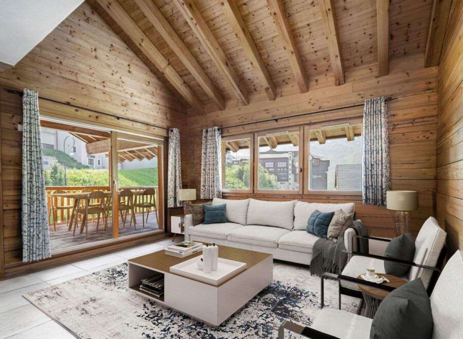 Experience the charm of this stunning property, featuring a cozy living room with a wooden ceiling and walls.