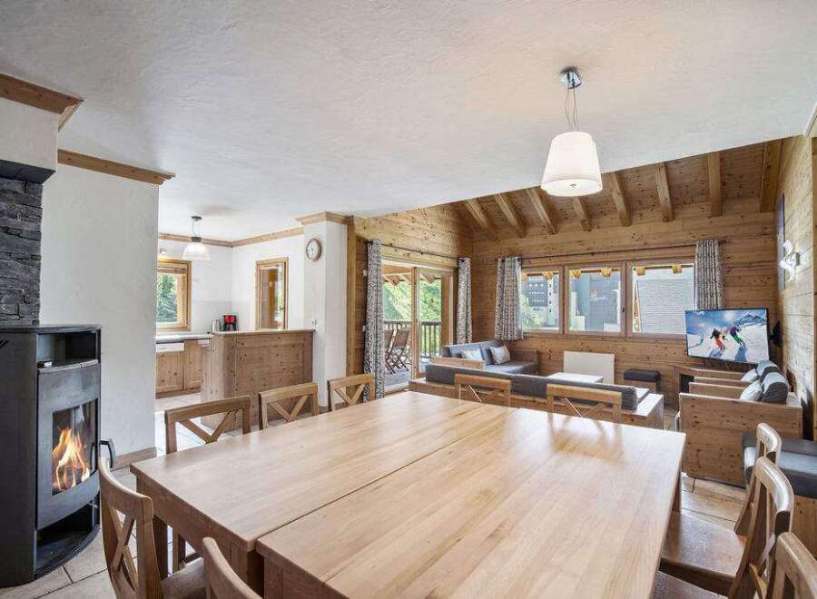 Experience the warmth of this stunning chalet, perfect for a cozy getaway.