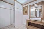 This charming bathroom features a modern design with a touch of rustic elegance.