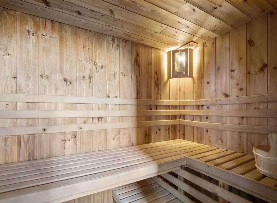 Step into relaxation with this stunning sauna.