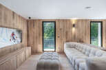 Experience modern luxury in this stunning living space, featuring a sleek design and high-end finishes.