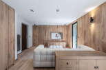 This stunning living room showcases a modern design with a warm, inviting ambiance.