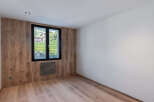 Discover the charm of this inviting space, featuring stunning wood paneling and a bright, airy ambiance.