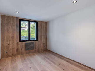 Discover the charm of this inviting space, featuring stunning wood paneling and a bright, airy ambiance.
